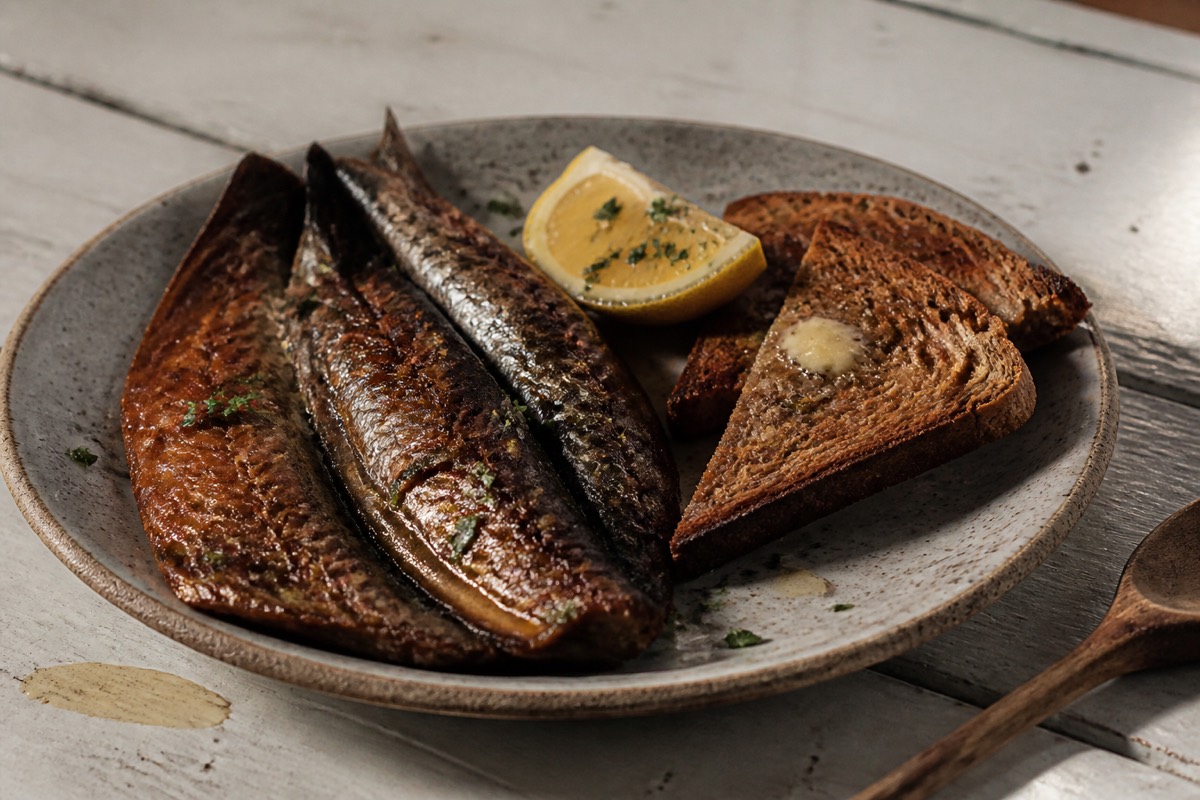 Grilled kippers with lemon butter & brown toast